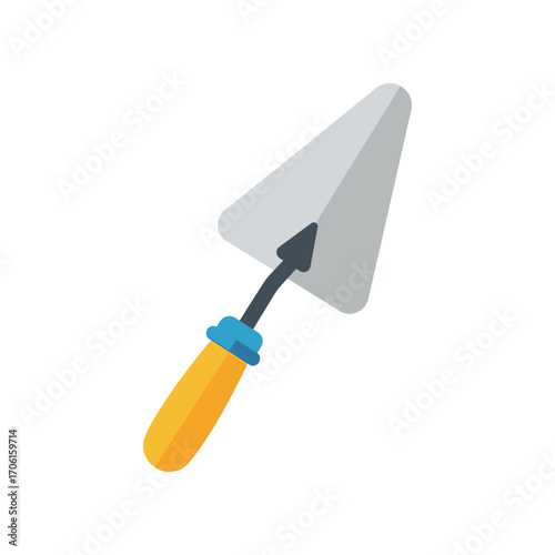 A gardening trowel resting on a surface, ready for planting flowers in a sunny garden