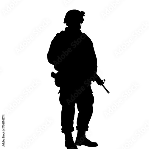 Silhouette of a fully equipped modern soldier standing guard with rifle and tactical gear