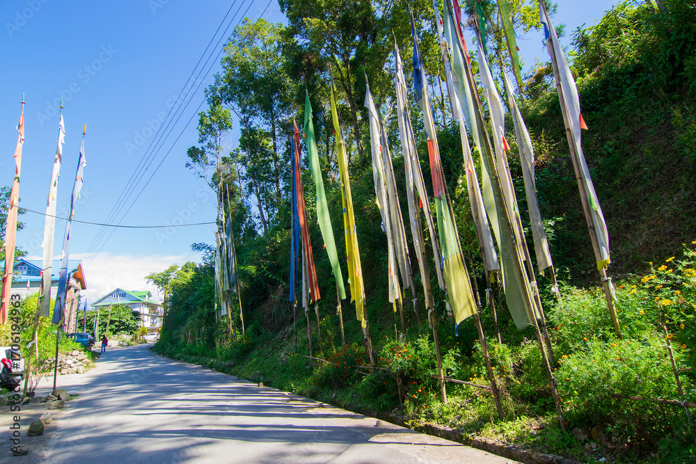 Fototapeta premium Buddist prayer flags for the departed souls, waving at Rinchenpong Monastery, Sikkim, India