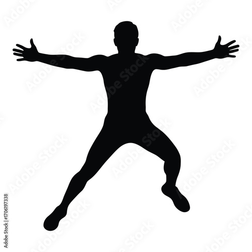 Silhouette of a man in dynamic jumping pose arms spread wide expression of joy silhouette