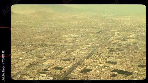 Cusco, Peru: Flying into the city of Cusco, Peru, retro 8mm vintage film camera, handheld style