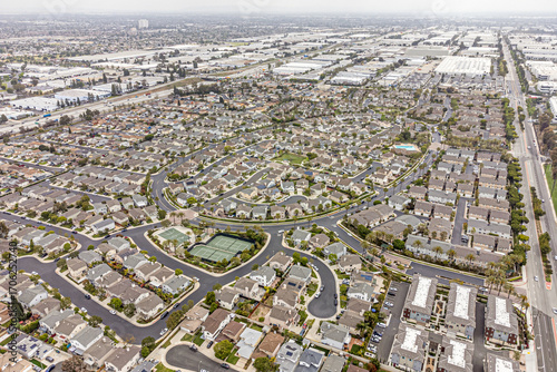 Carson, Los Angeles LA County, CA, California, May 9, 2024: Aerial Drone City View toward Townhouses, California State University,  Houses, Streets
