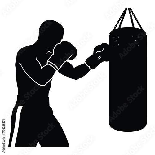 Silhouette of a boxer training punching a heavy bag for fitness and combat sports silhouette