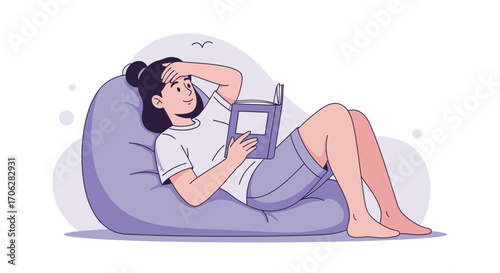 Relaxed Woman Reading a Book on a Beanbag Chair Enjoying Some Downtime Comfortably