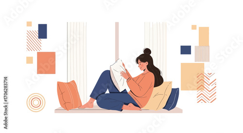 Relaxing Young Woman Reading Book by Window with Pillows and Geometric Elements