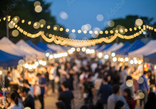 bustling outdoor night market with blurred crowd under warm string lights and vendor tents
