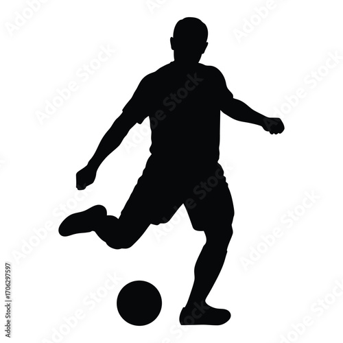 Dynamic silhouette of a soccer player kicking the ball in action silhouette
