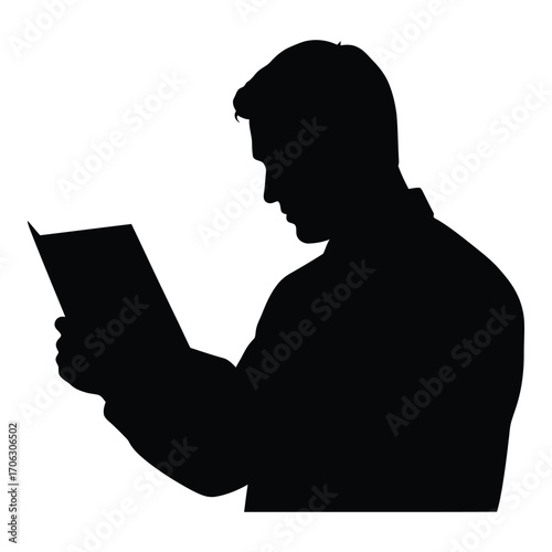Silhouette of a man deeply engrossed in reading a book silhouette