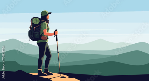 Woman Hiker Standing on a Mountain Peak with Green Mountains in the Background