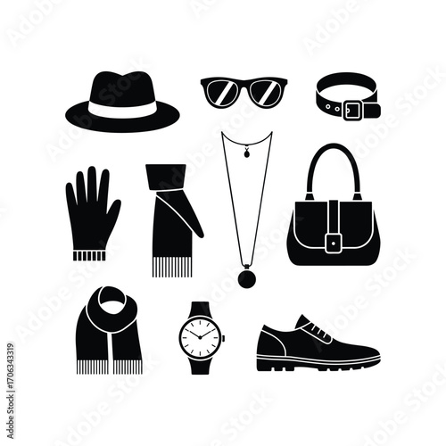 Collection of stylish black fashion accessories for women and men laid out neatly