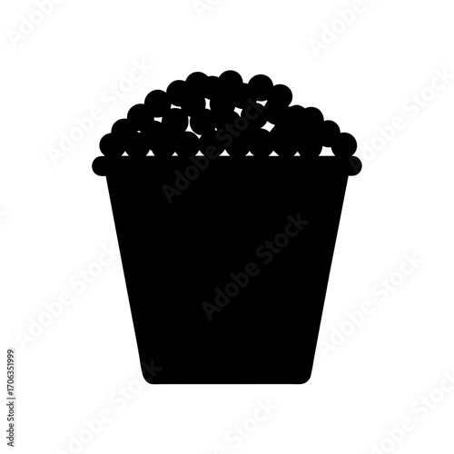 Black and white silhouette of popcorn bucket overflowing with tasty treats