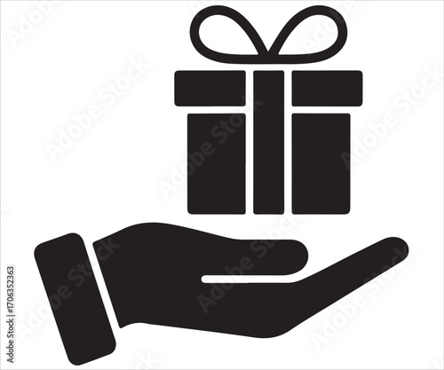 Hand holding gift box silhouette with ribbon bow symbolizing giving and celebration