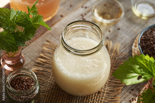 DIY shampoo made with homemade flax seed gel, argan oil, apple cider vinegar, nettle and coco glucoside