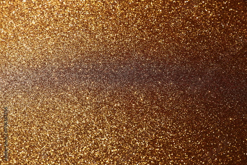 Gold sparkle shiny background, golden luxury pattern