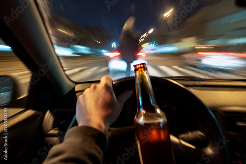 Anti-drunk driving ad: intoxicated driver's distorted view of road with alcohol bottle visible.