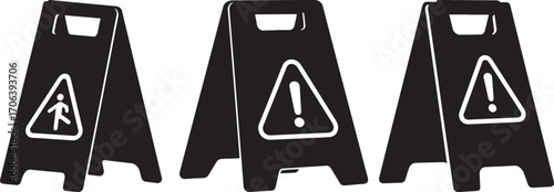 Three black wet floor caution signs silhouette