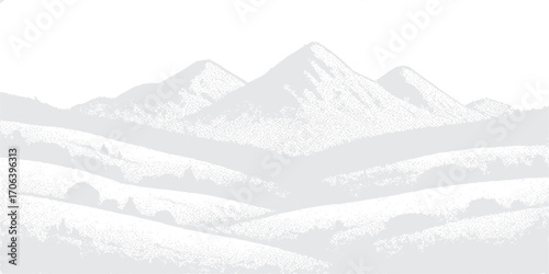 A beautiful winter landscape of snowy mountains under a clear sky