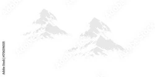 A snowy winter mountain landscape with a high alpine peak, featuring a panoramic view of the cold, icy range under a clear sky