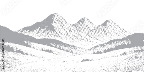 A panoramic view of snowy mountain peaks under a clear sky in the winter landscape