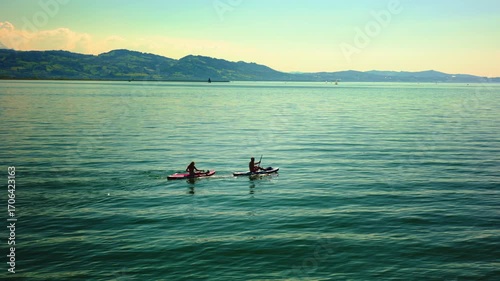 boy and girl on a SUP board at sea seaside vacation, loving couple on boats on water
