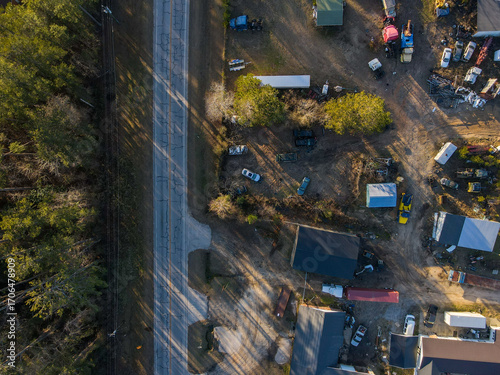 Aerial top down car graveyard winter after Hurricane Helene in Dearing McDuffie Augusta Georgia