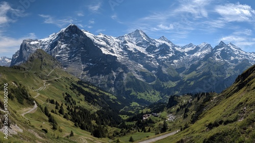 Wallpaper Mural Snowy mountain peaks rise above green valleys under a partly cloudy sky Torontodigital.ca