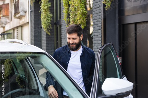 Man entering car