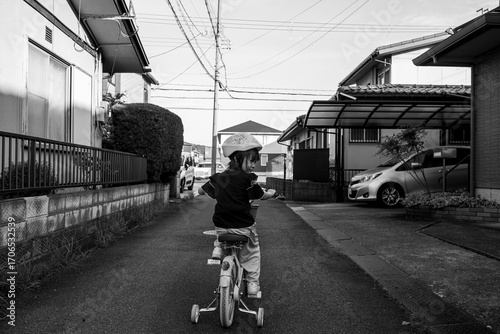 Little girl on bicycle