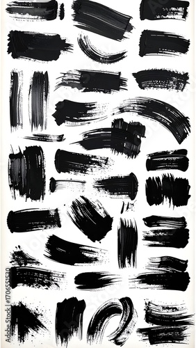 Collection of black paintbrush strokes on white