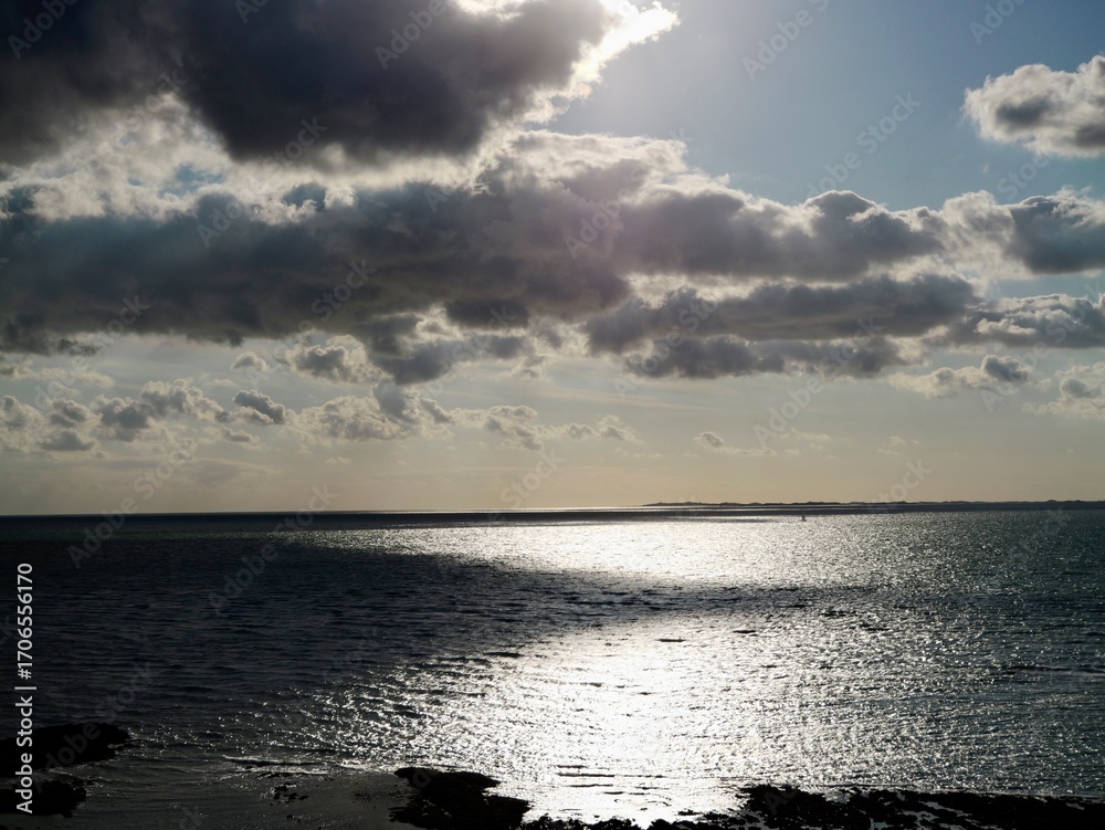 Obraz premium Sunset over the North Atlantic Ocean. Granville, Lower Normandy, France