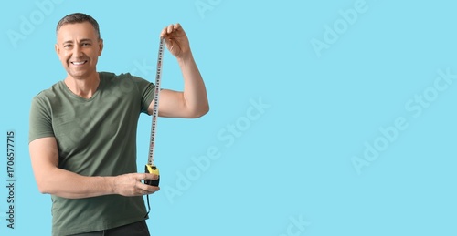 Middle-aged man with tape m...