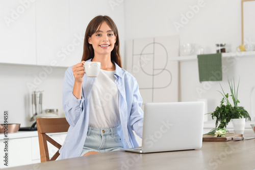 Young woman with cup of cof...