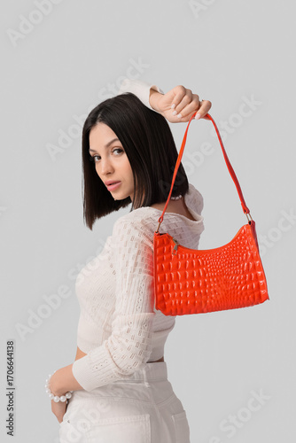 Beautiful young woman with ...