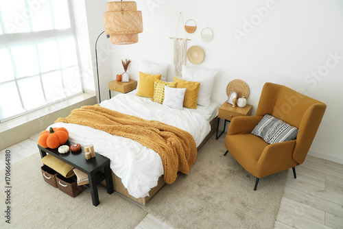 Interior of light bedroom w...