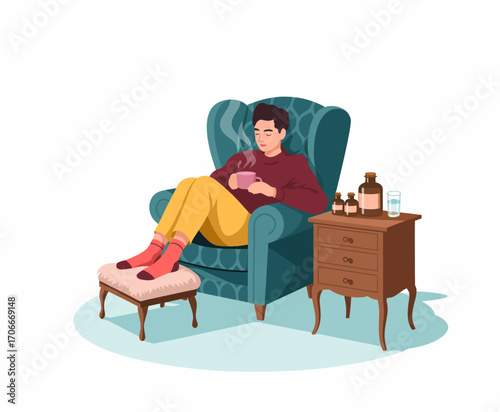 A person relaxed in a plush chair, sipping a warm beverage, surrounded by essential items on a small table, creating a cozy and inviting atmosphere for relaxation and comfort.