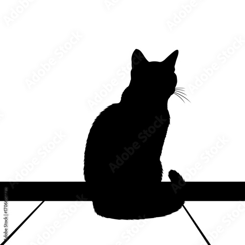Black cat silhouette sitting on a ledge isolated on white background