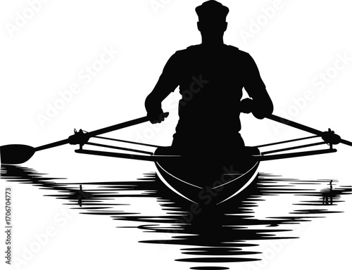 Silhouette of a sculling rower on calm water