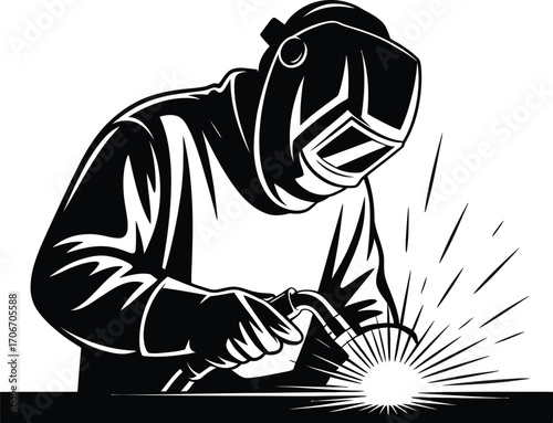 Skilled welder at work creating sparks silhouette