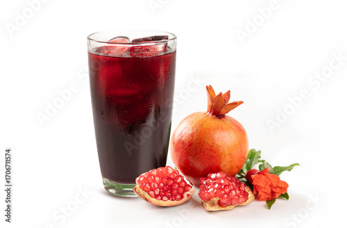Pomegranate juice and pomegranate isolated on white background.