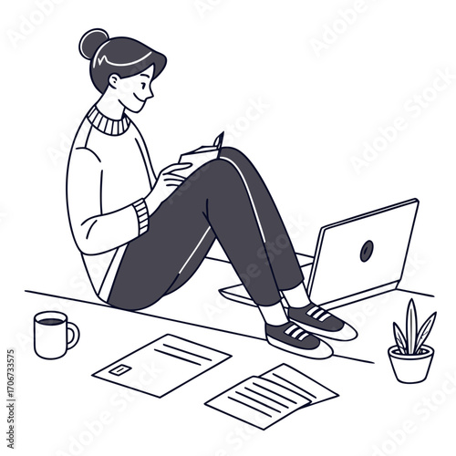 A young woman sits comfortably on a desk engrossed in reading a book with a laptop papers a coffee cup and a potted plant nearby illustrating a relaxed work or study environment