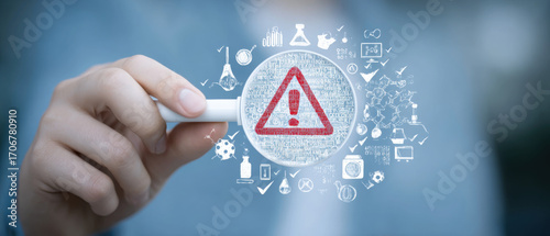 Cybersecurity Risk Assessment with Magnifying Glass and Warning Sign