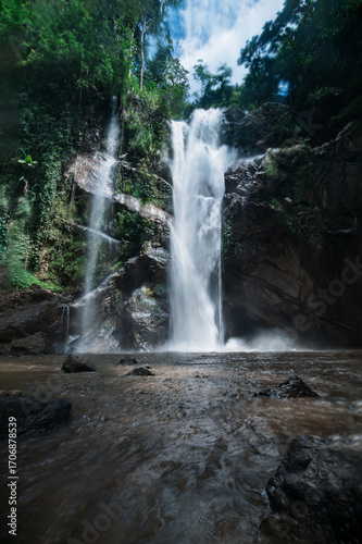 Stunning Waterfall in Chiang Mai Surrounded by Lush Greenery