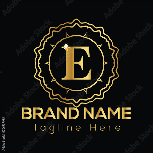 Golden letter E inside ornate circular emblem with brand name text below on black background