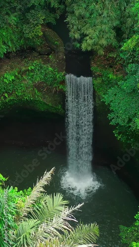Bali famous landmark and popular travel destination Tibumana waterfall Bali, Indonesia 4K