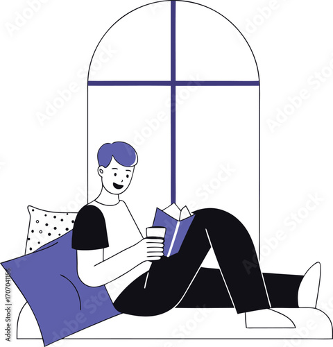 Smiling boy in casual clothes reading a book on a window seat with a pillow and a drink child
