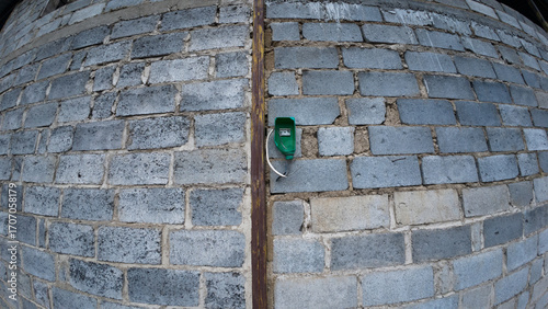 Exposed Electrical Box on Unfinished Brick Wall