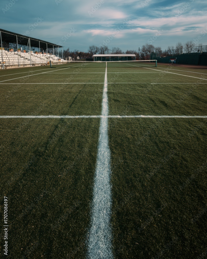 Fototapeta premium Professional Tennis Court with Freshly Painted Lines and Stadium Seating Modern Sports Facility for Premium Event Marketing and Organized Competition
