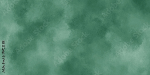 Abstract Elegant dark green background with mottled vintage texture in old fancy background design, texture of colored parchment paper.	