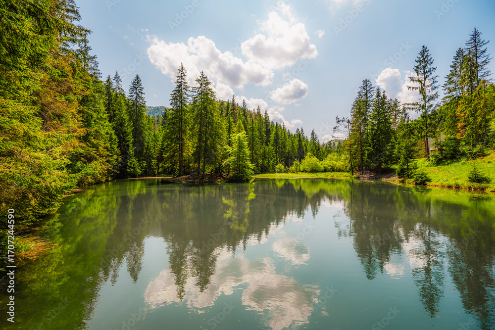 Obraz premium Blajzloch lake in slovak paradise national park in Slovakia. Beautiful and peaceful lake with crystal clear water