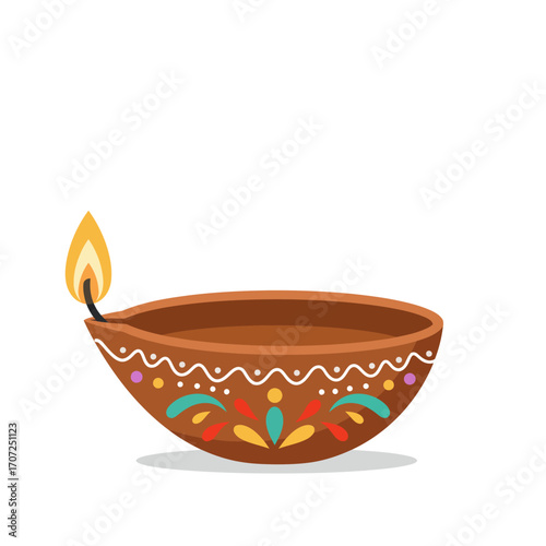 A beautifully decorated traditional Indian clay lamp, a diya, symbolizing the concept of light, hope, and prosperity for the festive Diwali celebration